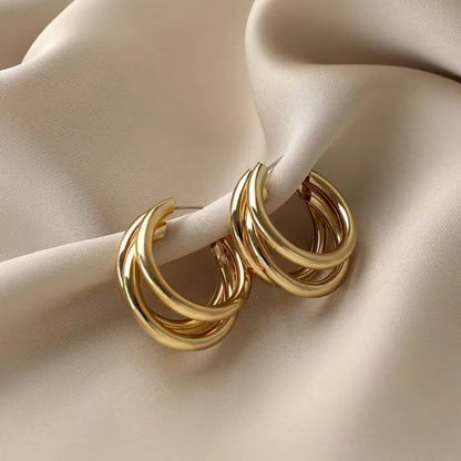 Three Hoops. One Earring. Total Attention — Triple Gold Layered Hoops | Office Wear
