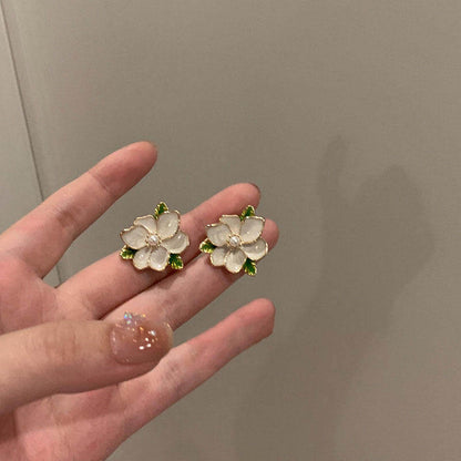 Garden Bloom Pearl Stud Earrings | White Enamel & Golden Petal Design